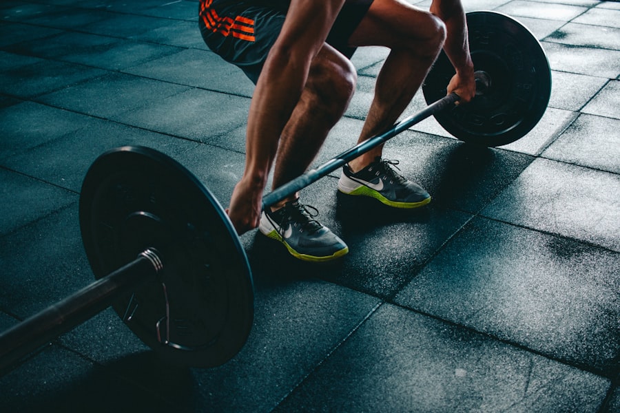 Athlete lifting a barbell in a gym